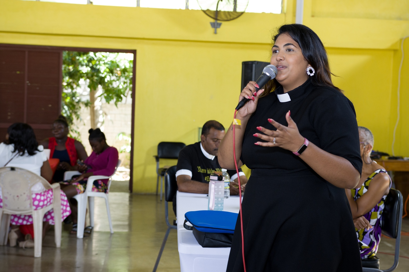 Picture of Rev. Cynara Dube-Khan presenting during the Brunch Forum on Human Rights Day