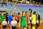 Picture of Player Escort Mascots for both teams as they walk out in “Draw the Line Against Gender Based Violence” t-shirts at the CONCACAF Women's Road to Gold Cup qualifier between the Senior National Teams of Trinidad and Tobago and Mexico at the Hasely Crawford Stadium