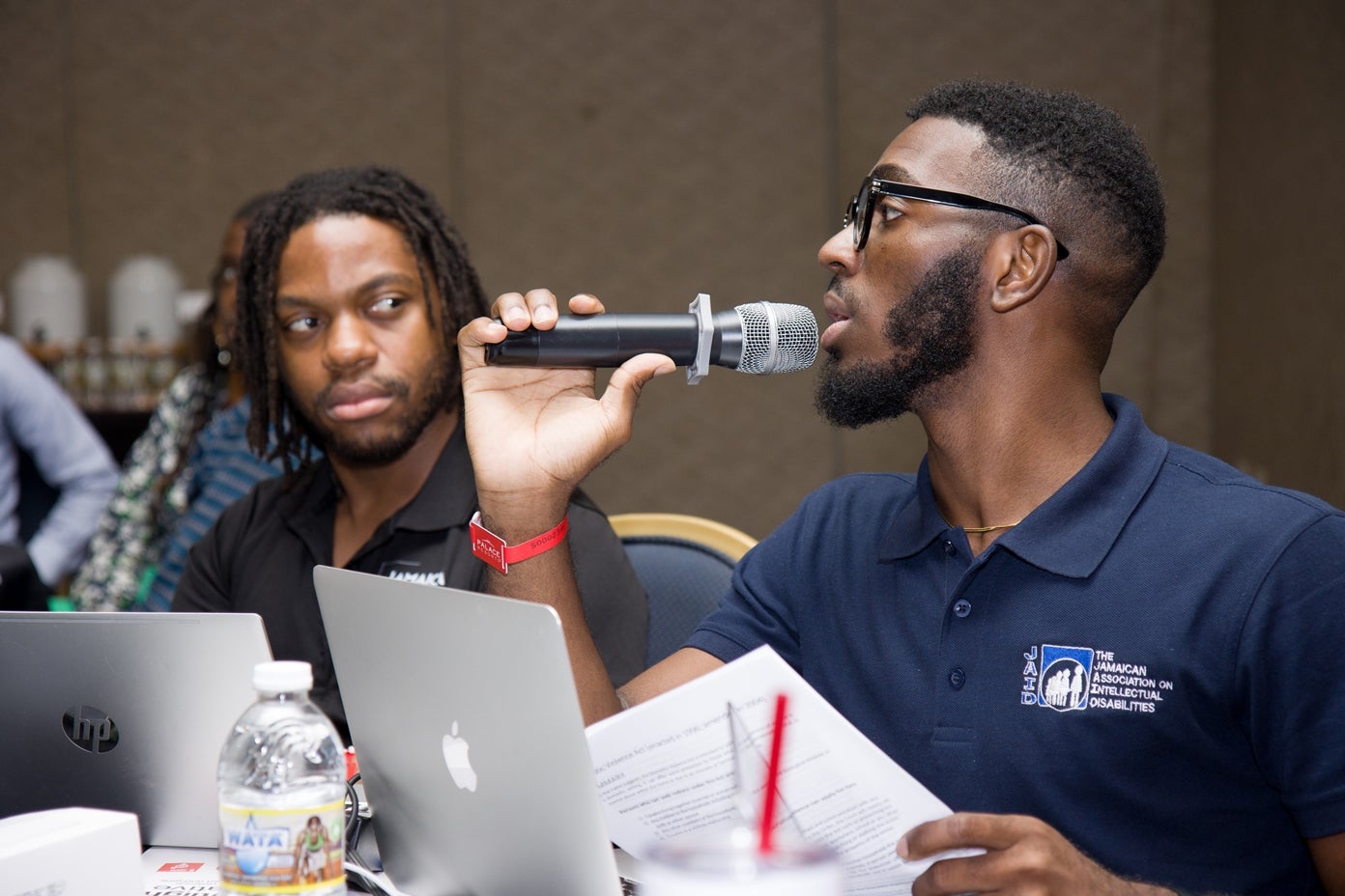 Picture of Gavane Ferguson, Development Manager for The Jamaican Association on Intellectual Disabilities (JAID) participating in the discussions