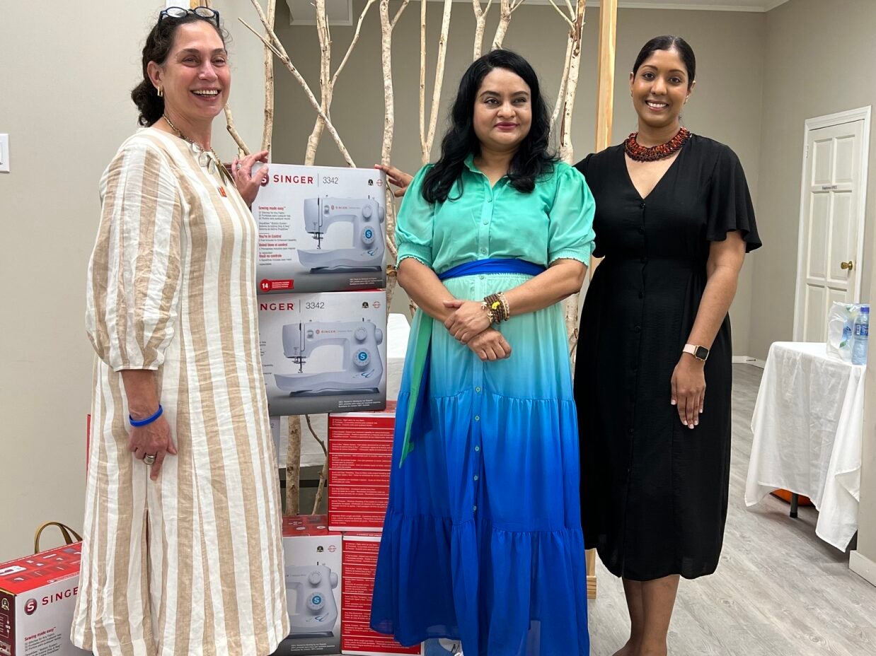 Picture of Je'nille Maraj, UN Women Planning and Coordination Specialist looks at some of the products on display at the business incubator. The products were made by women entrepreneurs