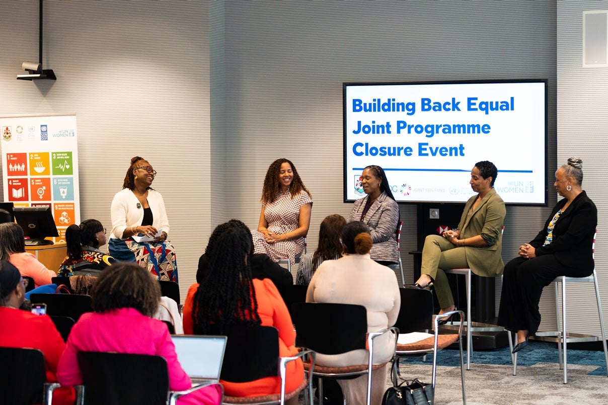 Panellists in dialogue during the event