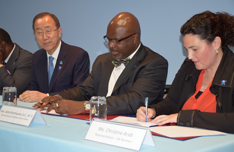 United Nations Secretary-General Ban Ki-moon, Attorney General looks on as Minister of Home Affairs of Barbados, the Hon. Adriel Brathwaite Q.C. M.P. and UN Women Representative Christine Arab sign a MOU between UN Women and the Government of Barbados/Office of the Attorney General