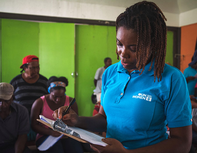 UN Women Programme Specialist Isiuwa Iyahen conducts a Post Disaster Needs Assessment in October 2017, following the September 2017 hurricane in Dominica. Photo: UN Women/Sheldon Casimir