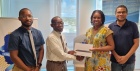 Presentation of tablets to BSS by Isiuwa Iyahen, Deputy Representative of UN Women MCO Caribbean